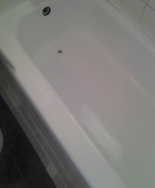 Dallas Bathtub Services bonded a new surface to the bathtub.